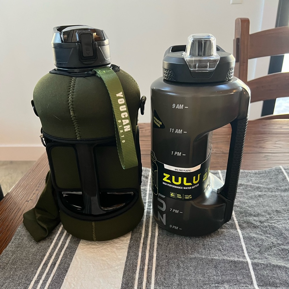Green and Black Water Bottles set of Two Zulu brand new. Holds 64 oz each!